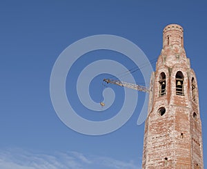 The building of the church. Elevating crane.