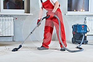 Building cleaning service. dust removal with vacuum cleaner