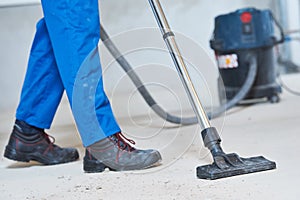 Building cleaning service. dust removal with vacuum cleaner