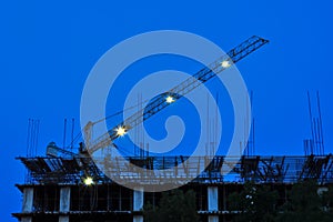 Building and construction in progress with crane.