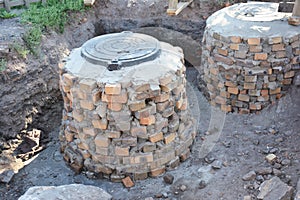 Building construction septic tanks from bricks