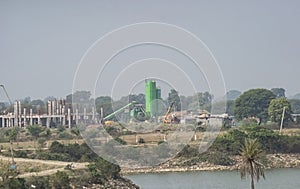 Building Construction Site with Cement Concrete Mixing Plant