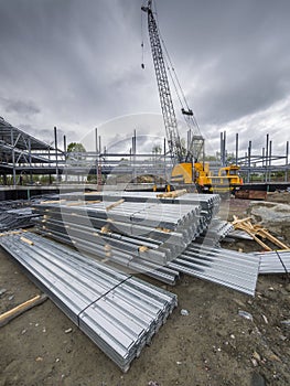 Building construction site with crane