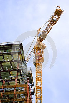 Building construction site with crane