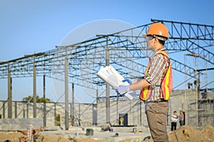 Building construction supervisor Viewing construction plan