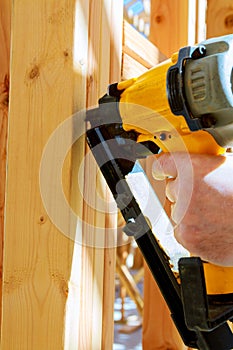 Building contractor worker putting in a interior wall partition