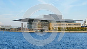 Building of Copenhagen Opera House in sunny autumn day, view from other side of Oresund strait