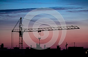 building crane sunset