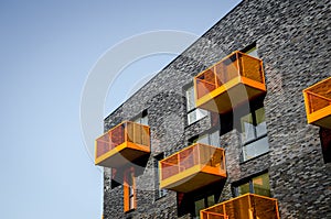 Building de Hele Kolen in Groningen city, nice architectural building with orange balconies photo