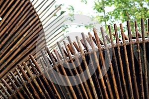 Building with decorative structure made of bamboo canes photo