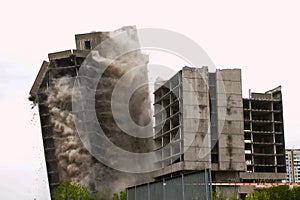 Building demolition by controlled implosion
