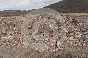 Building demolition demolished ruin stone and bricks rubble debris pieces