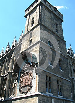 Building detail with clock tower in Paris, France