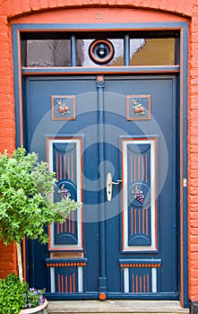 Building, detailed view of a front door or entrance door