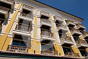 Building facade with many identical balconies