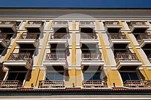 Building facade with many identical balconies