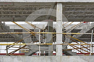 Building facade under construction. Concrete structure. Architecture.