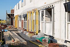 Building family houses at a construction site