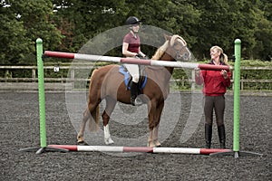 Building a fence at a riding school