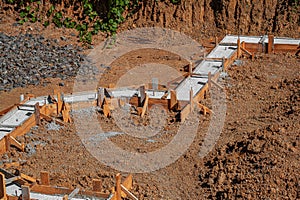 A building foundation with wooden formwork