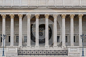 Building front of a public law court in Lyon, France, with a neoclassical colonnade corinthian columns