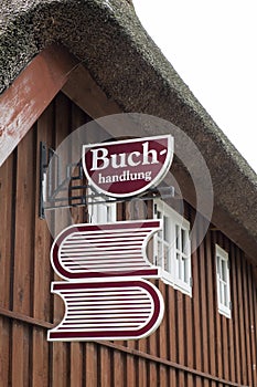 Building German Buchhandlung translates into bookshop in Englisch photo