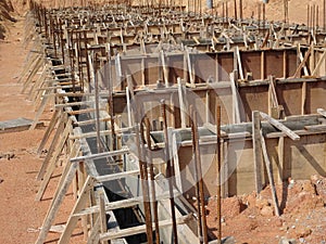 Building ground beam under construction using temporary timber plywood at the site.