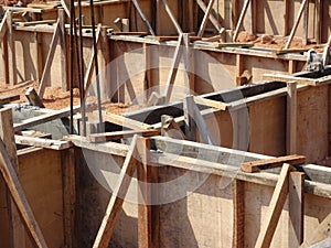 Building ground beam under construction using temporary timber plywood at the site.