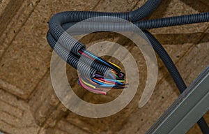 Building a house electrical wiring in an isolated corrugation photo
