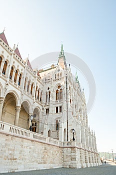 Building of Hungarian National Parliament viewed from the side of the Dunabe river in Budapest, Hungary