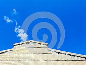 building industrial old white blue sky ,white smoke