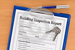 Building Inspection Report with Pen and Keys photo