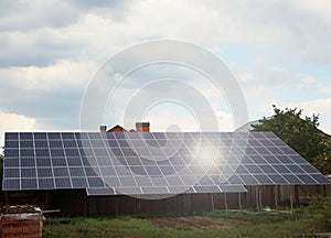 Building with installed solar panels. Alternative energy source