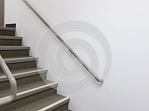 Building interior white staircase with handrails
