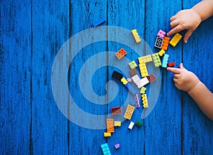 Building kids blocks on blue background