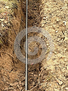 Building of lines of metallic and fiber optic cables. Laying underground tow network connection cable.