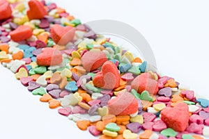 Building loving relationship: road paved sweets in the form of hearts. Love concept, space for text