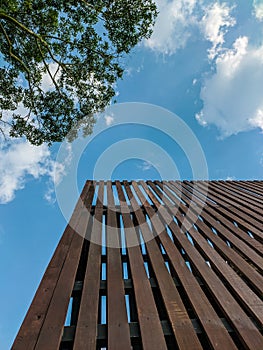 Building in Majalengka, Indonesia with blue sky background and tree.