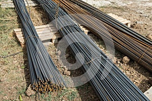 Building materials outdoors. Rebar at a construction site. Armature for construction.