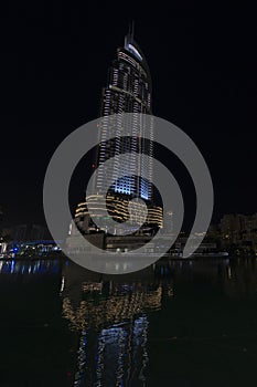 Building near Burji Khalifa at night in Dubai