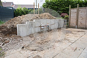 Building a new garden with stones, fences and trees