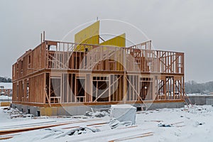 Building of New Home Construction exterior wood beam construction