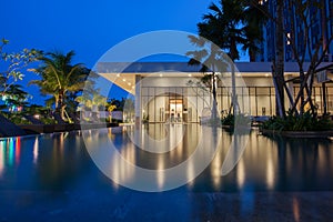 Building at night time reflection on water