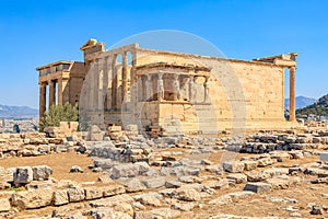 The building is old and has a lot of columns, Acropolis in Athens