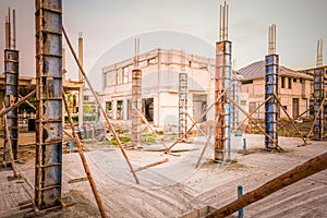 Building process of a house column in construction site on housing project