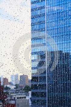 Building and rain drops on the window