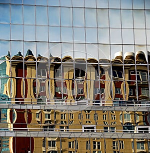 Building reflected in glass panels