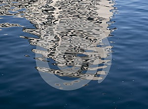 Building reflected in the waters of the Urumea river in the city of Donostia