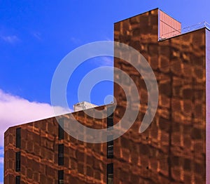 Building reflection on brick building