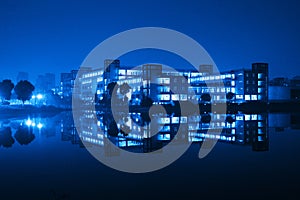 Building and reflection at night